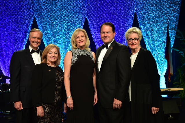 The 2018 TAR Leadership Team, from left to right, President/CEO Travis Kessler, Secretary/Treasurer Cindi Bulla, Chairman Kaki Lybbert, Chairman-elect Tray Bates, and Immediate Past Chairman Vicki Fullerton gather on stage before the Chairman's Installation at the 2017 Texas REALTORS® Conference.